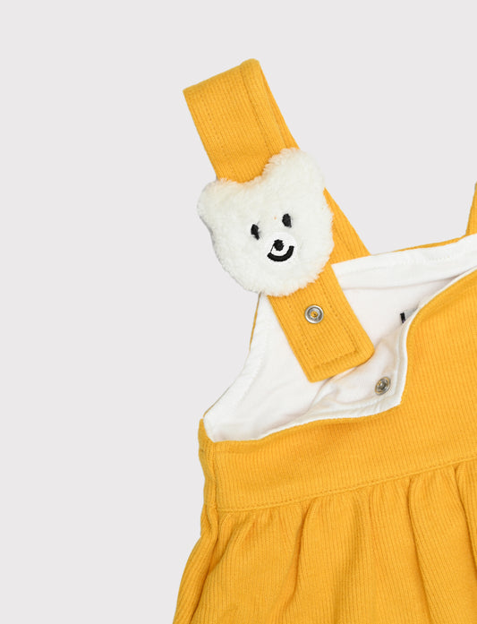 فستان بحمالات ودباديب  للعيد – تصميم عملي وأنيق لصغيرتكِ